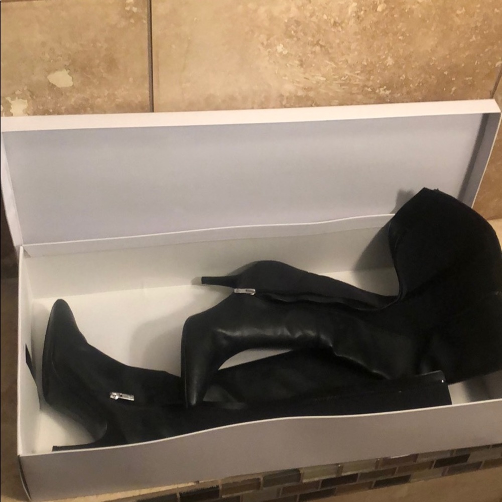 Brand new black Calvin Klein boots